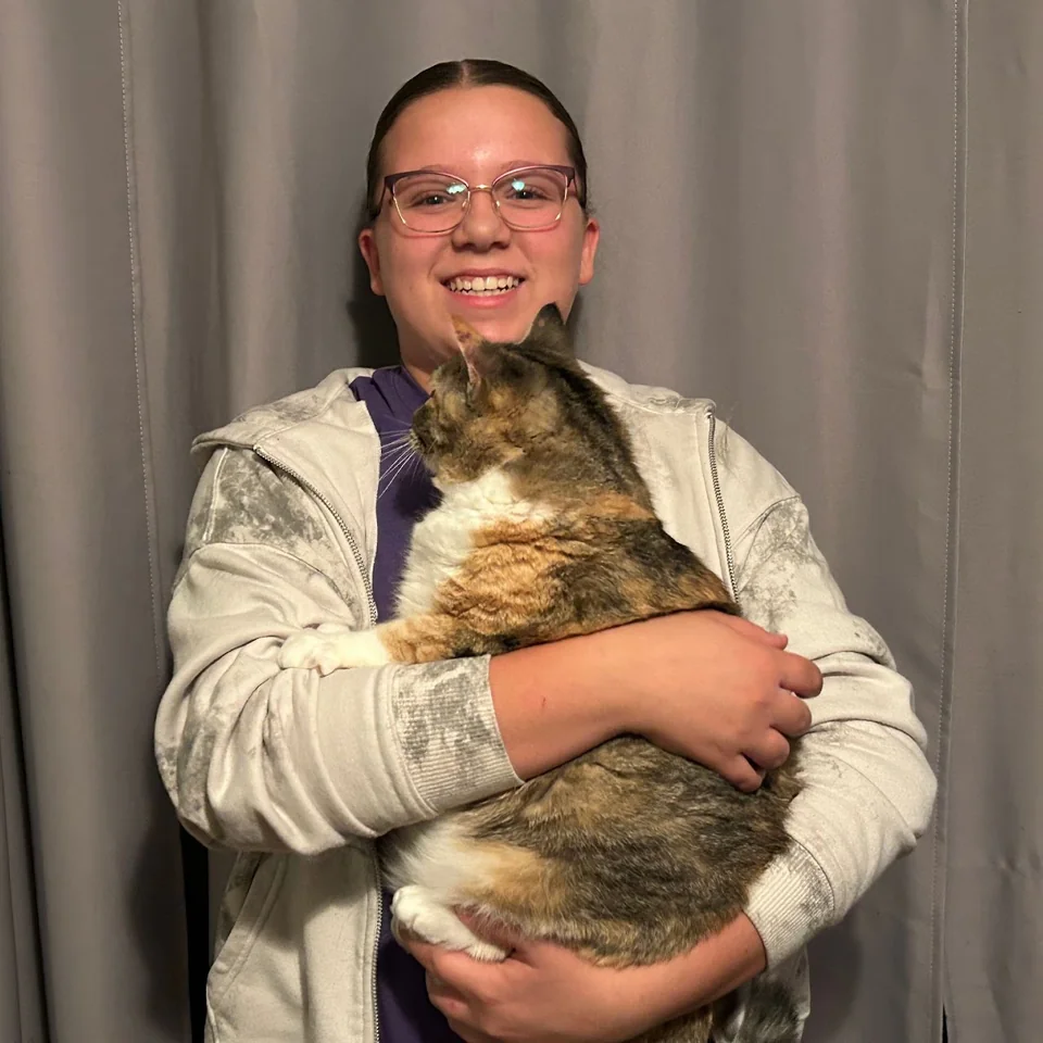 Trinity Greer with a cat
